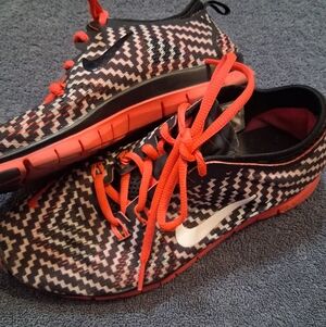 Nike Women’s Orange Zigzag Knit Sneakers